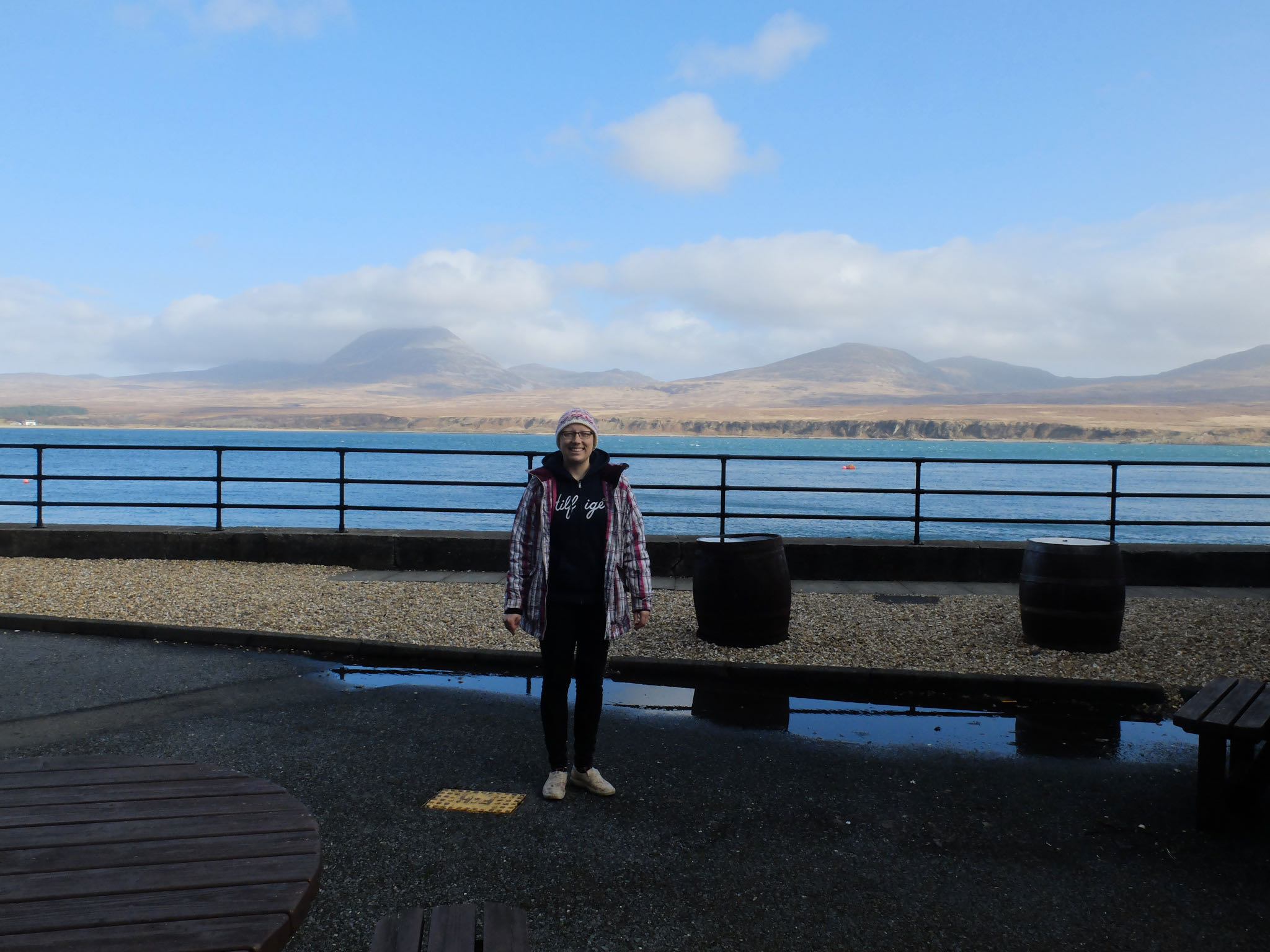 Me outside Caol Ila with Jura in the background